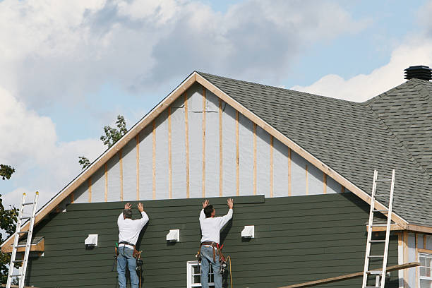 Professional Storm Damage Siding Repair technician working in Northfield, IL